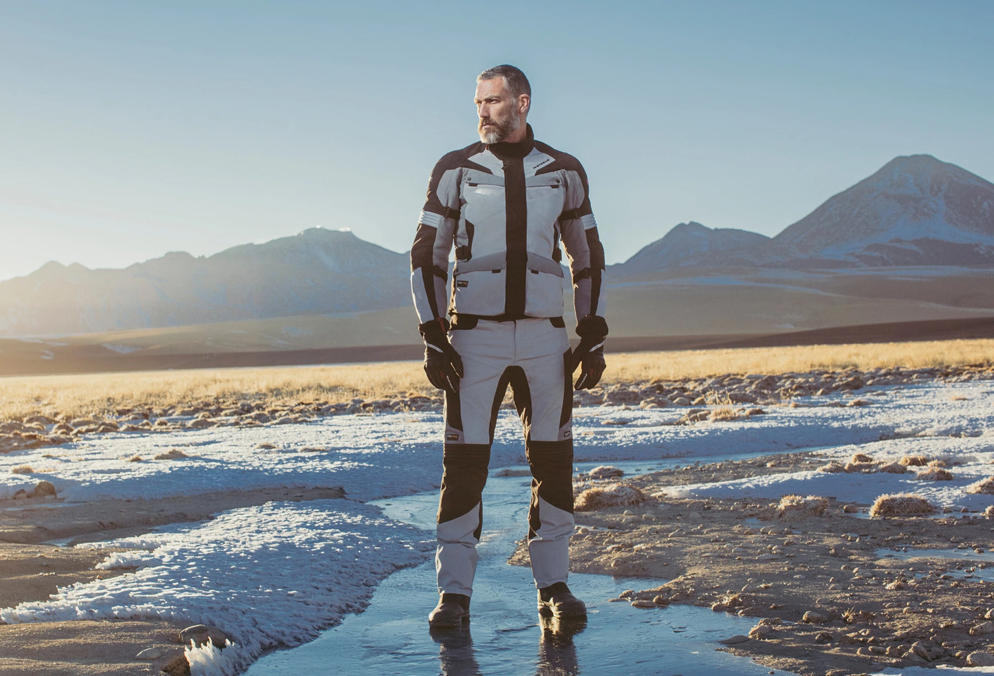 Spidi Alpentrophy H2Out Black Grey Winter Jacket for motorcycle enthusiasts features a waterproof, breathable H2Out membrane, CE certified protection, removable thermal liner, and customizable fit with reflectors for enhanced